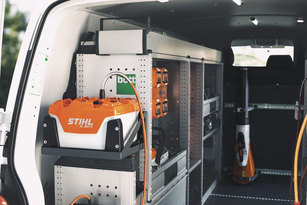 ALLPRO batteries and chargers in a workshop